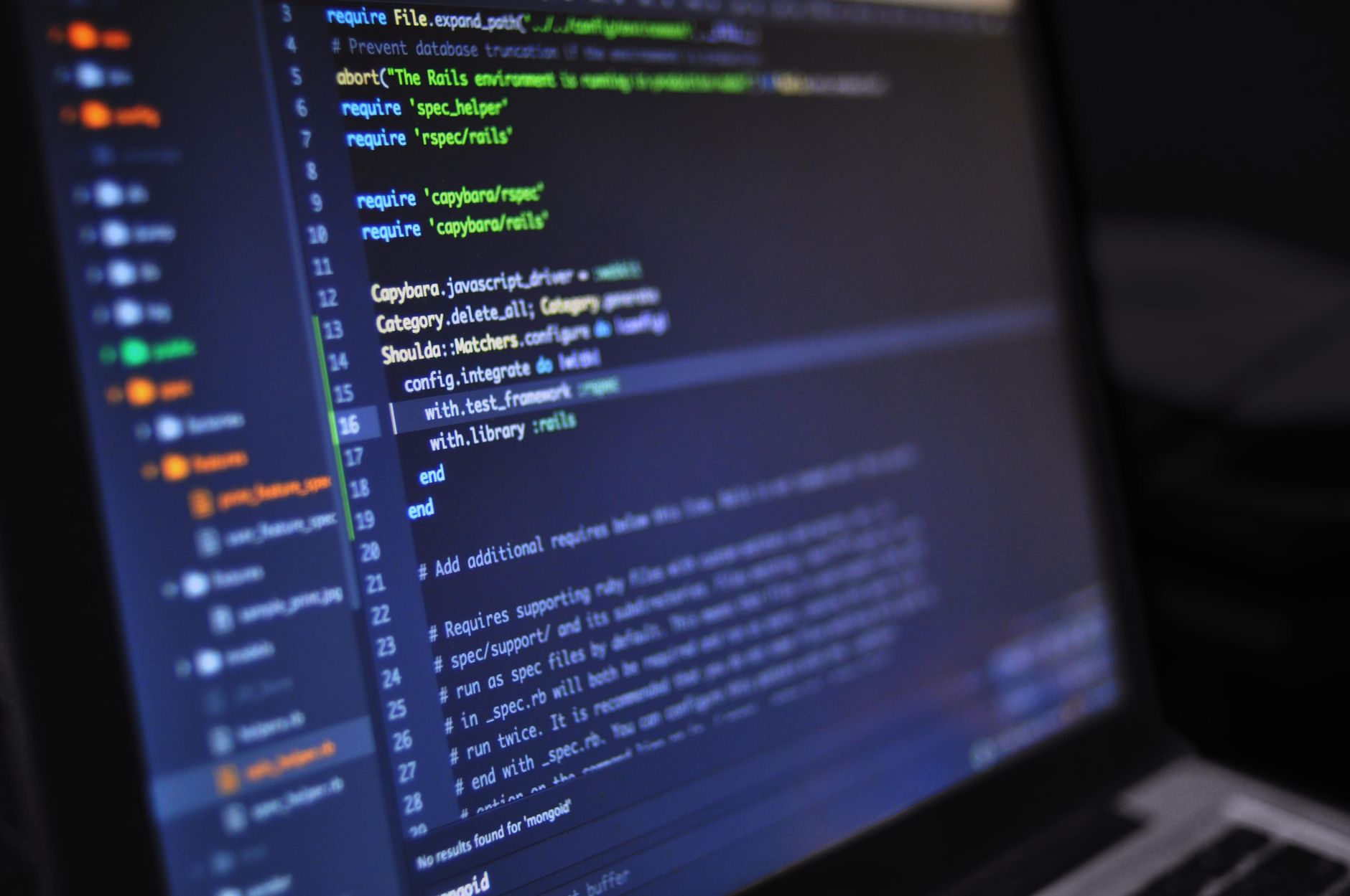 Close up on computer monitor displaying system engineering code